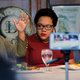“I don’t think television covered race enough” during the presidential campaign, Candace Smith, left, of ABC News said Tuesday at Mr. Henry’s restaurant in Washington. Yamiche Alcindor of the New York Times and Richard Prince look on. A smartphone, in foreground, recorded the conversation via Periscope. (Credit: Sharon Farmer/sfphotoworks)